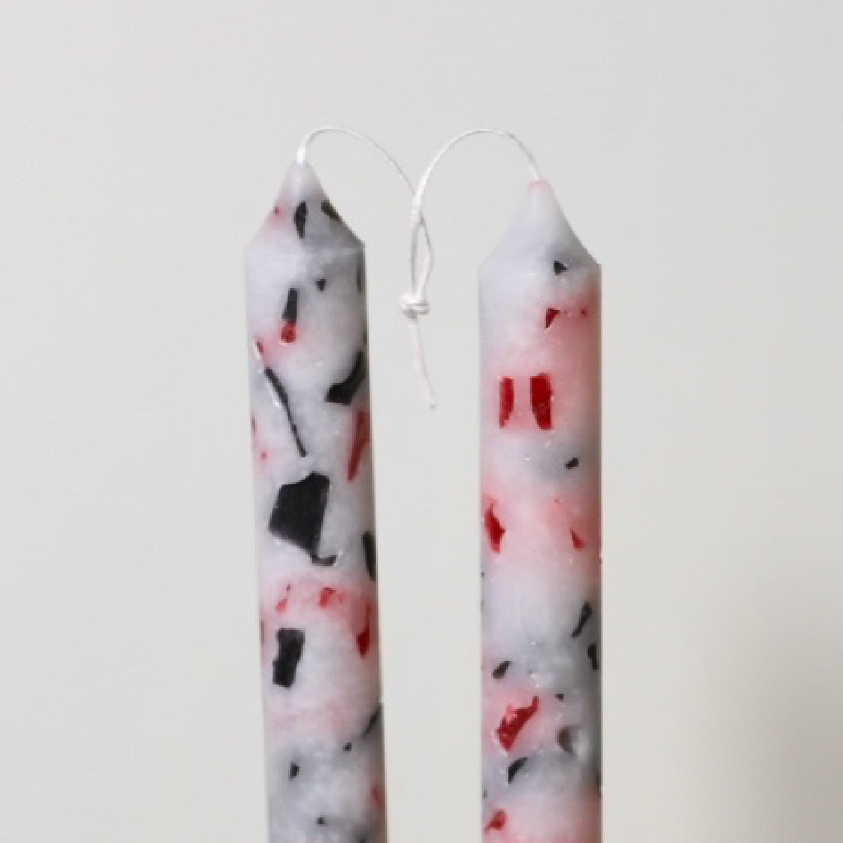 Hand made candles with terrazo pattern
