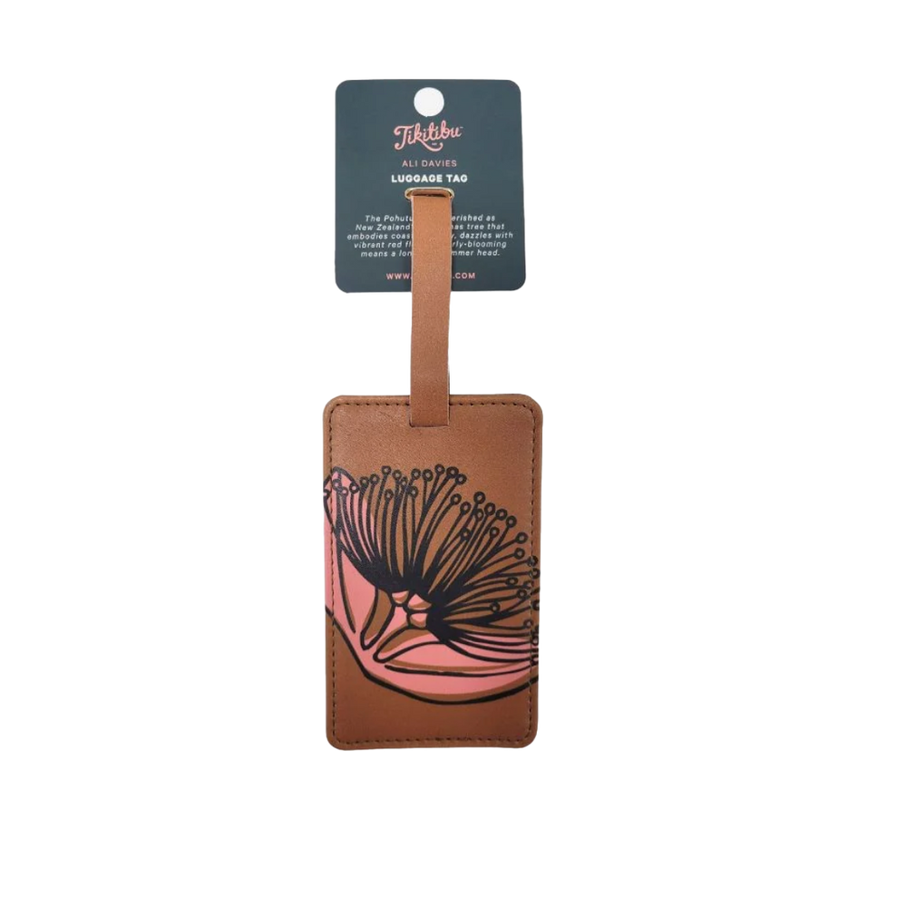 Mustard coloured tag with dark green pohutukawa print on it.