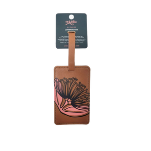 Mustard coloured tag with dark green pohutukawa print on it.