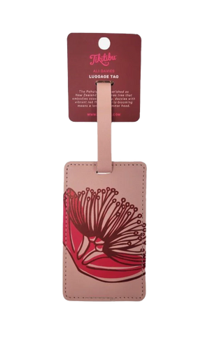 Pink bah tag with magenta pohutukawa print on it.
