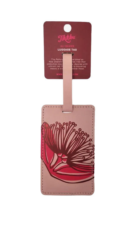 Pink bah tag with magenta pohutukawa print on it.